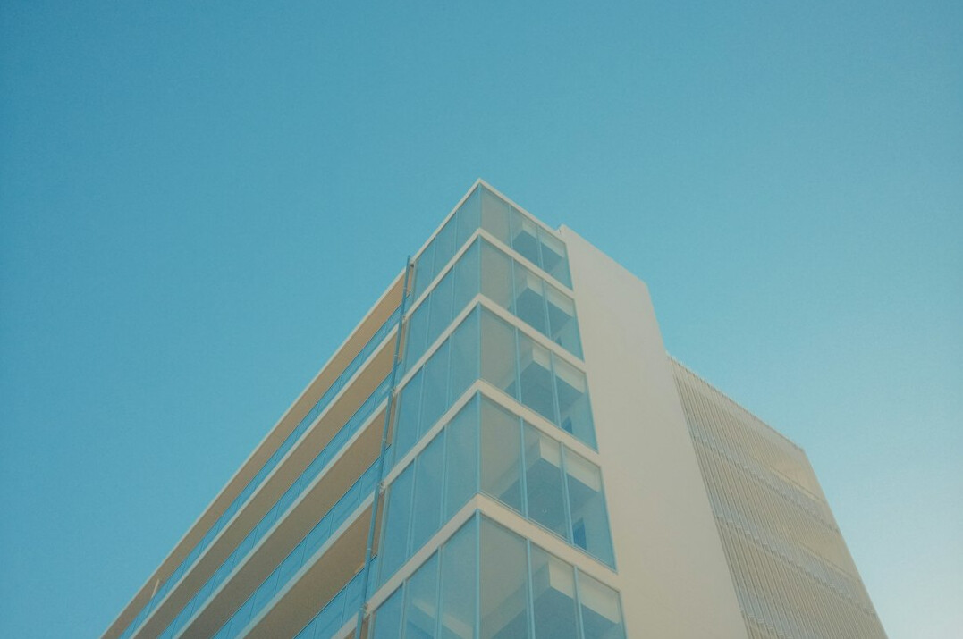 Modern office building exterior with glass facade
